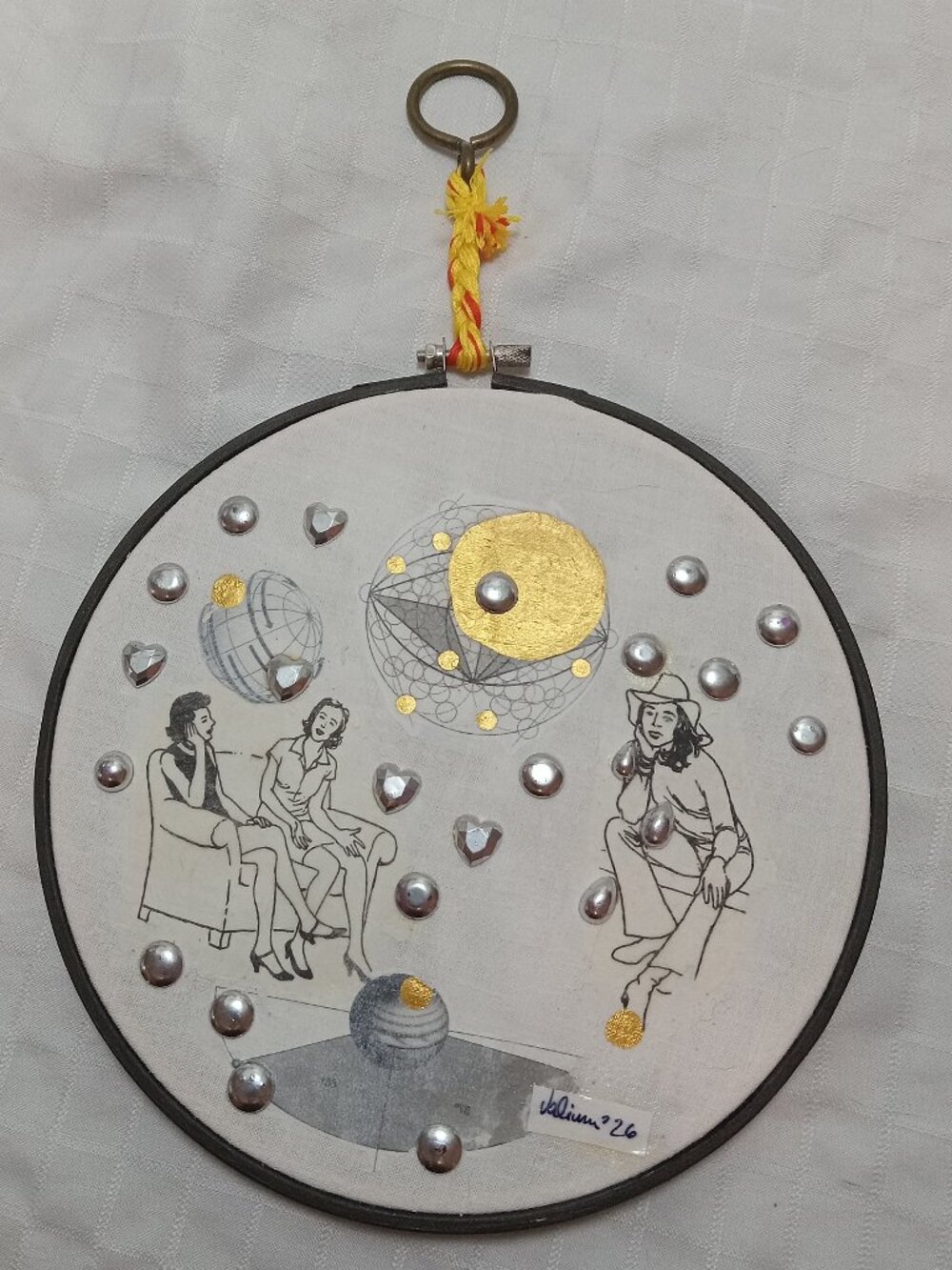Handmade prints of old magazines on cotton & mixed media in a cross-stitch hoop